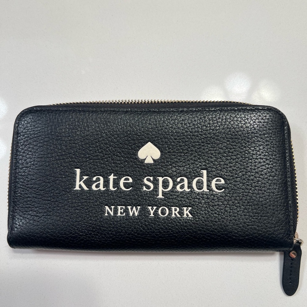 kate spade Ella large black zip-around pebbled leather wallet with white logo